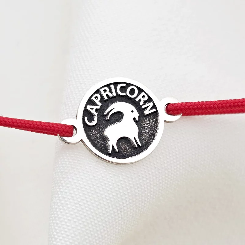 Ezüst Bak Csillagjegy Karkötő állítható zsinórral