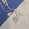 Lantisor personalizat - 3 Elemente - Banut cu constelatie, inima cu initiala si silueta cu nume - Argint 925 - Cristal Swarovski