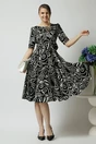 Rochie de zi din voal neagra cu imprimeuri si floare in talie