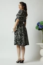 Rochie de zi din voal neagra cu imprimeuri si floare in talie