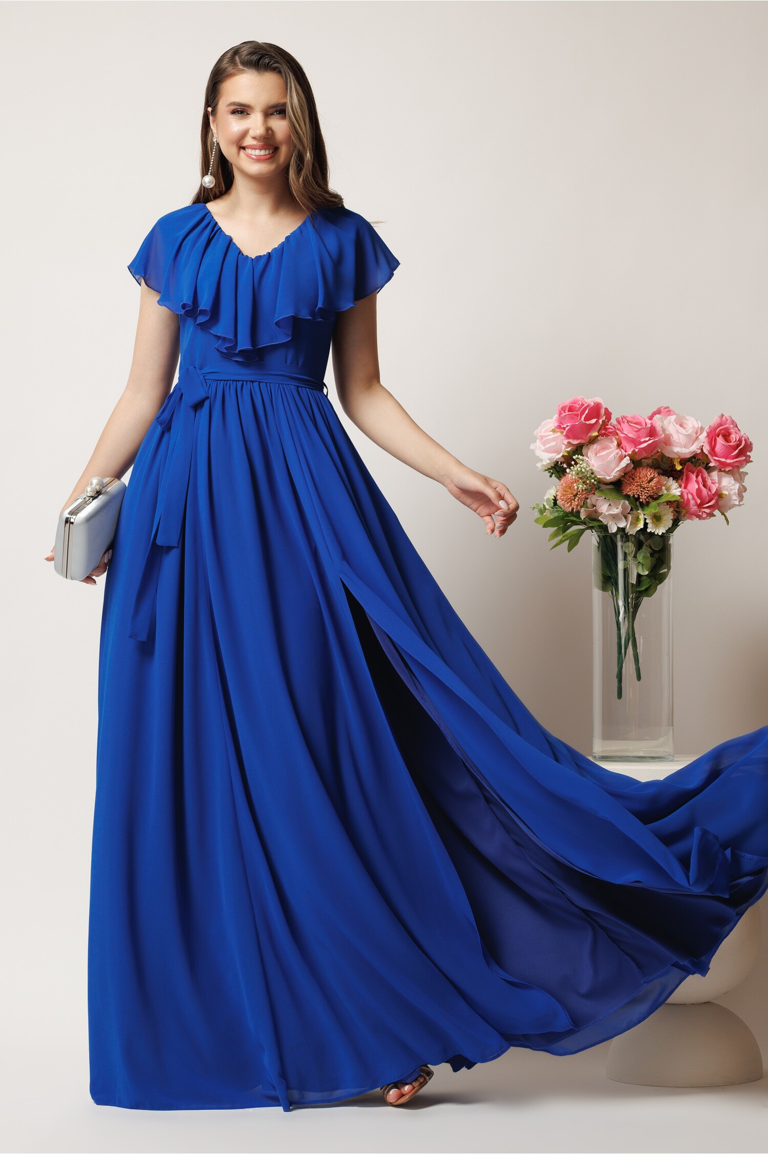 Rochie DY Fashion lunga albastra in clos din voal cu volanas la bust si crapatura pe picior