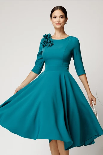 Rochie DY Fashion midi turcoaz din stofa in clos cu floare la bust