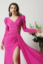 Rochie lunga de ocazie din lycra fucsia cu tull si strasuri in talie