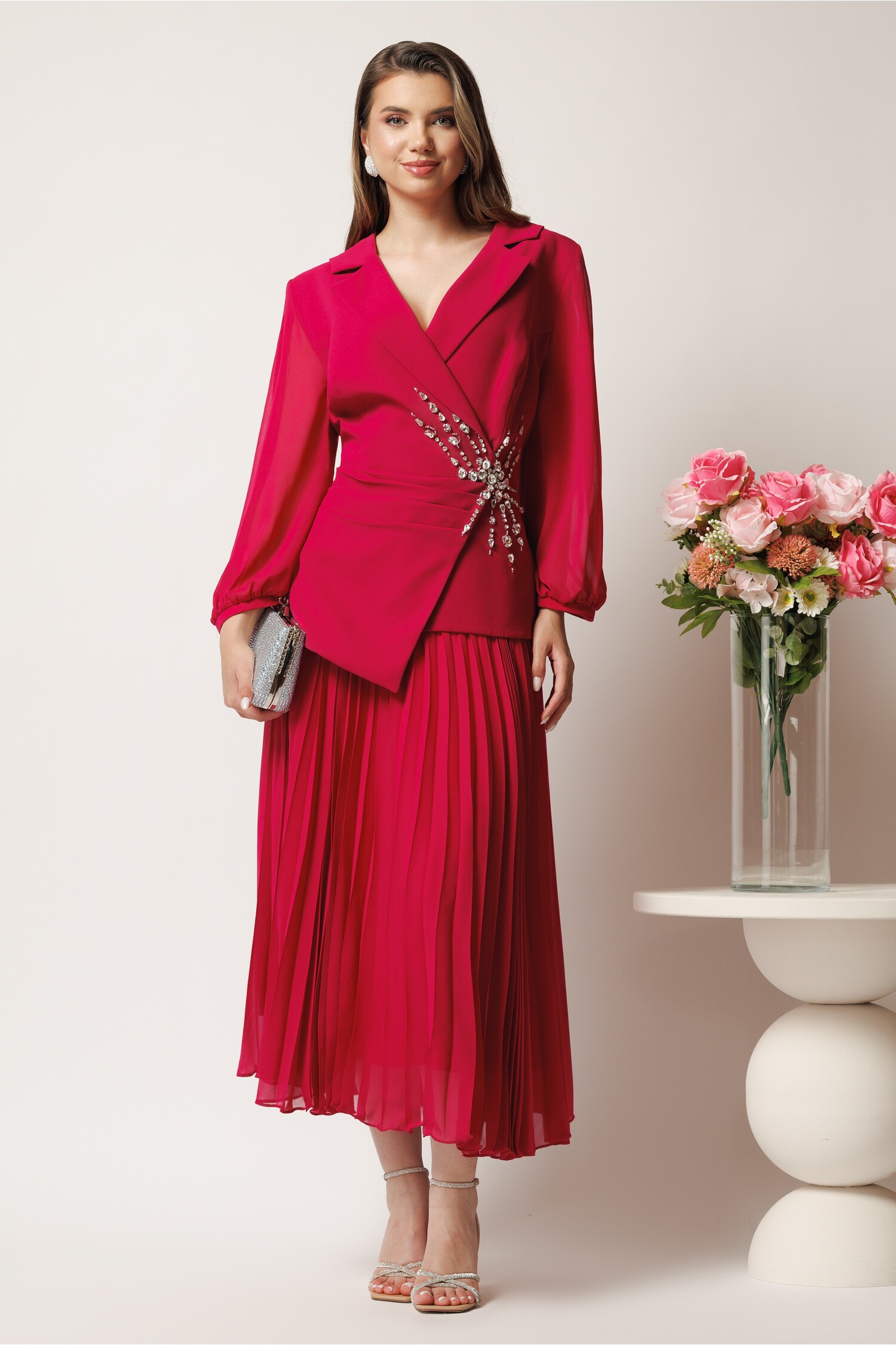Rochie midi fucsia in clos cu peplum si strasuri pe talie