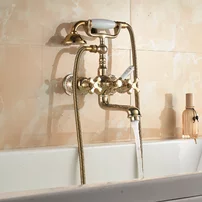 Baterie cada-dus Inter Ceramic Sahara dubla comanda auriu lucios cu set de dus
