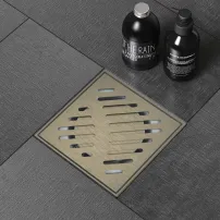 Set rigola pentru dus Inter Ceramic New Generation cu capac cu fante diagonale 10x10 cm finisaj bronz periat