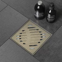 Set rigola pentru dus Inter Ceramic New Generation cu capac cu fante diagonale 10x10 cm finisaj bronz periat