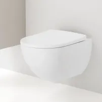 Стенна тоалетна чиния Geberit Acanto Rimfree с капак с плавно затваряне