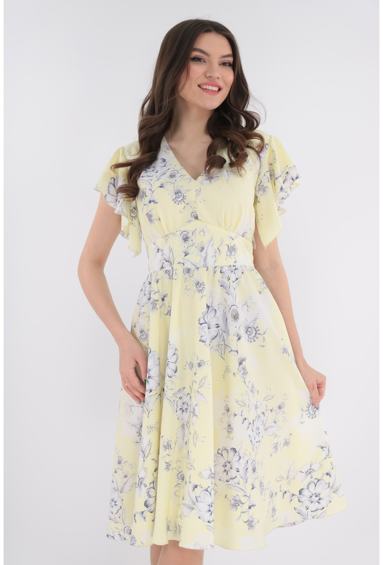 Rochie clos galbena cu desen floral alb